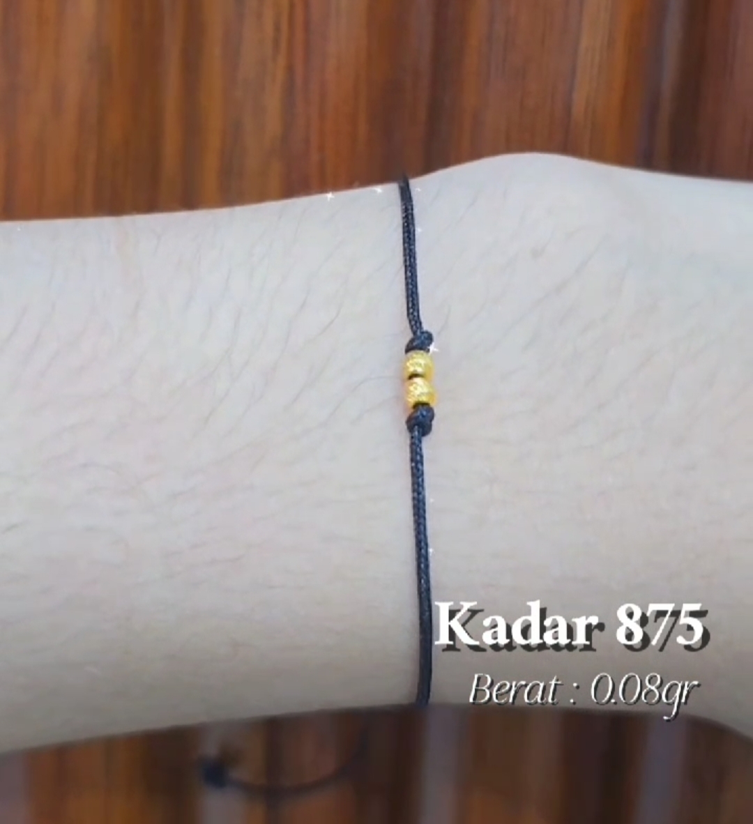 Gelang Simpul Hitam
